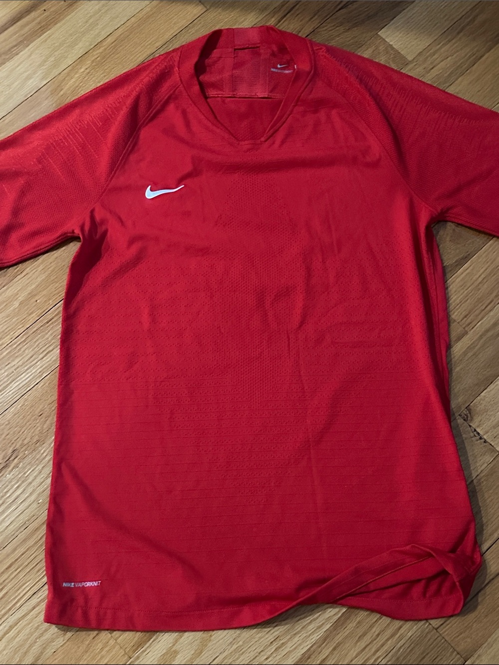 Nike Red Short-Sleeve Athletic Jersey with White Swoosh